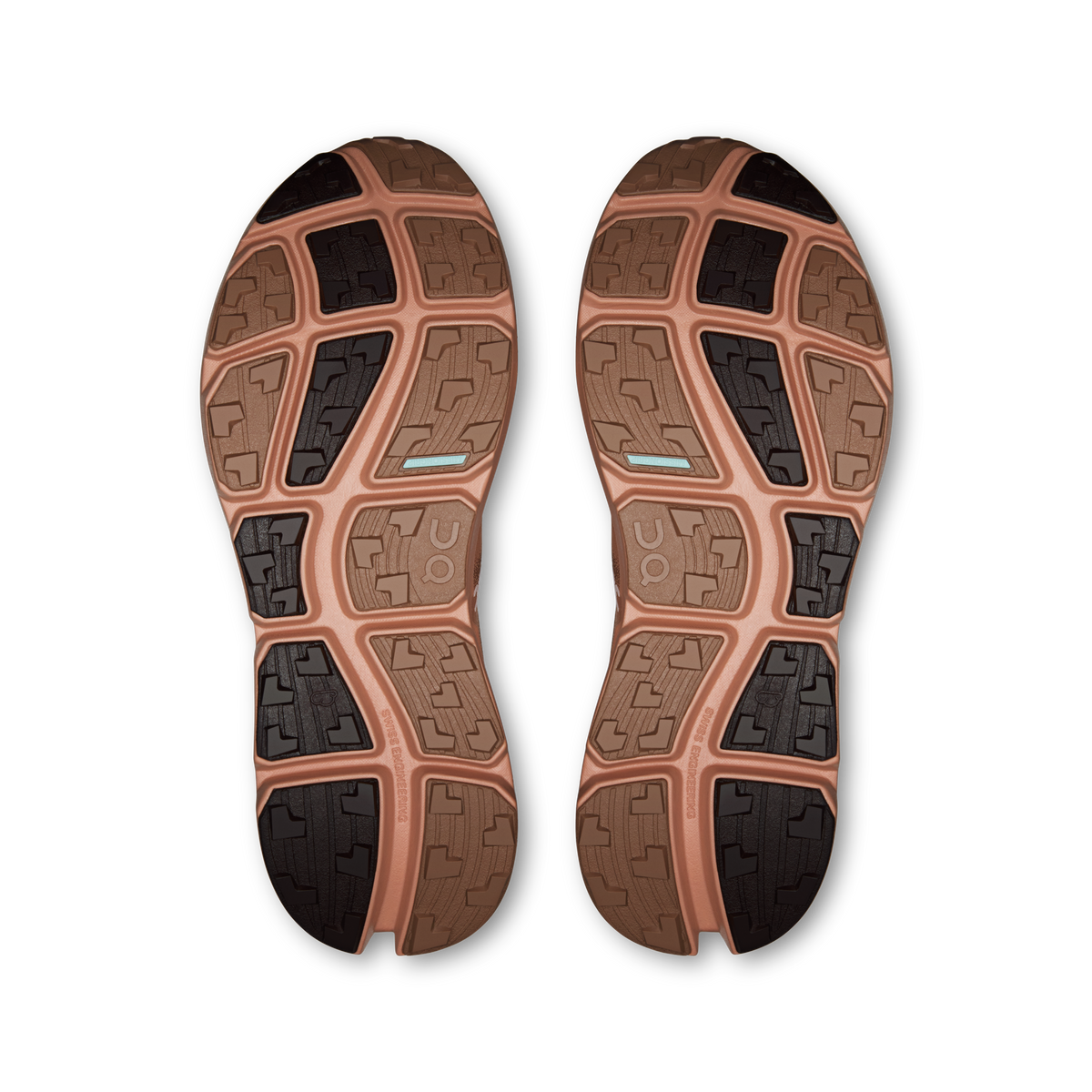 On men's running shoes outsole view with rugged traction tread, tan and dark rubber