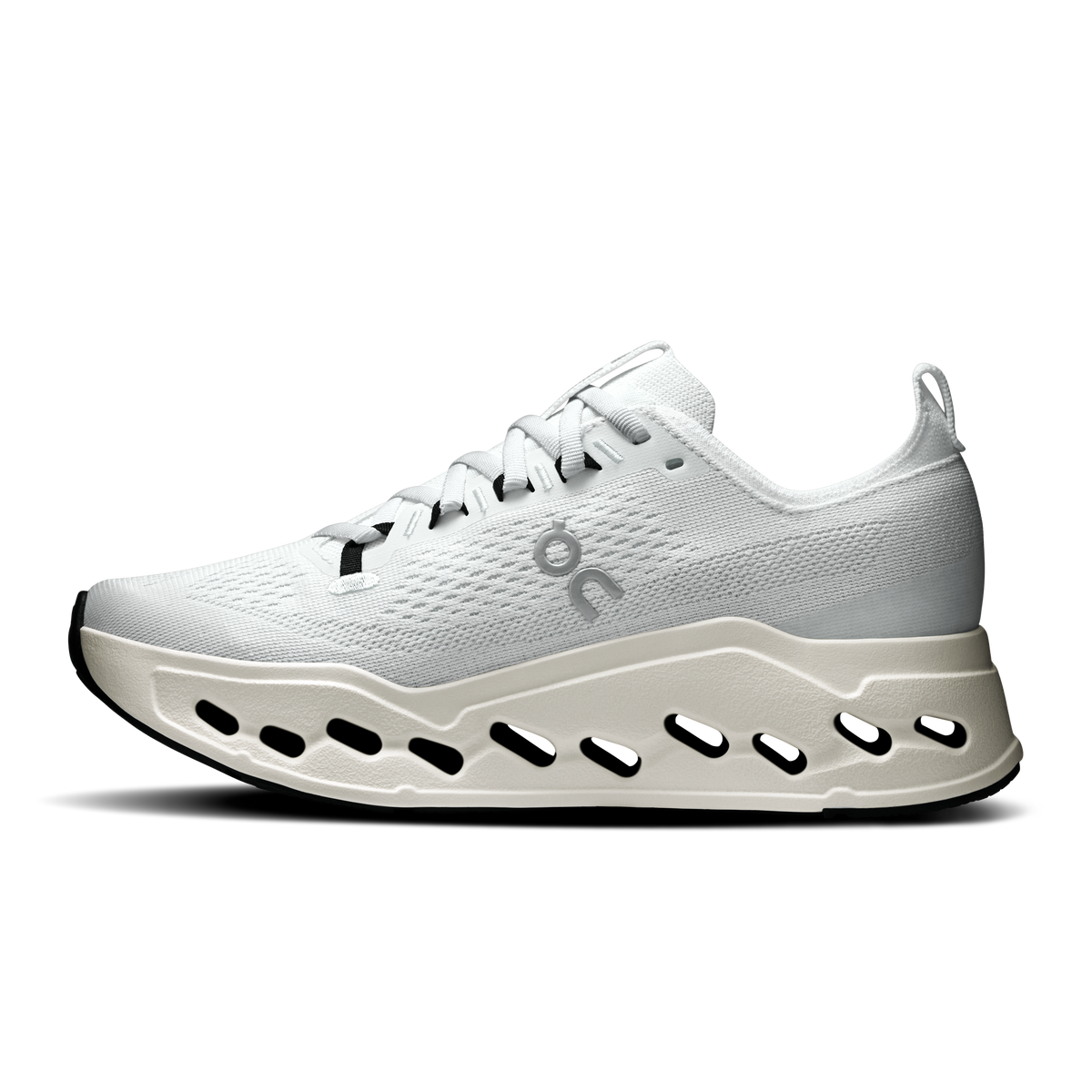 On women’s white low-profile running shoe with lace-up upper and CloudTec pods