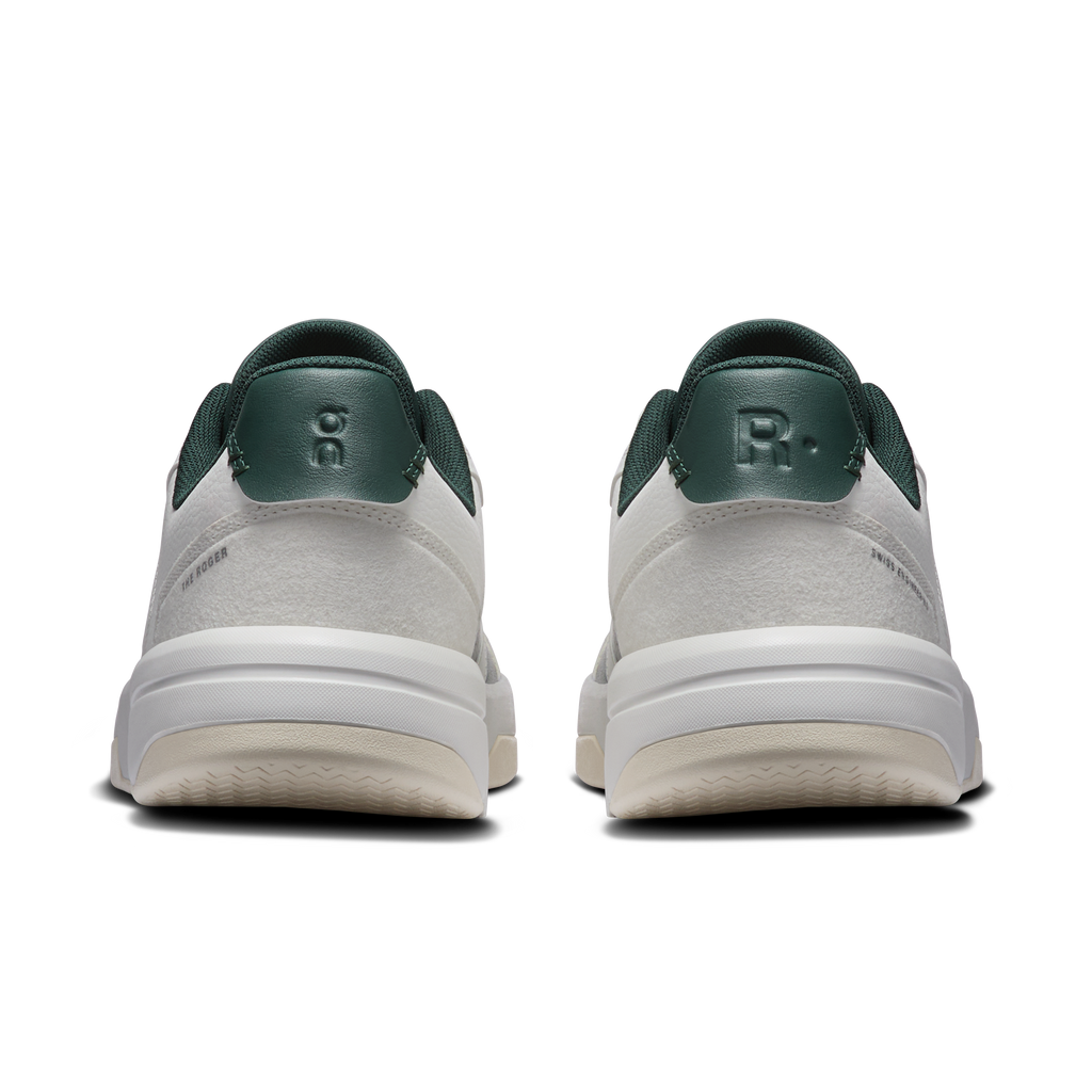 Men's sneakers heel view in ivory with olive back tab and cushioned collar
