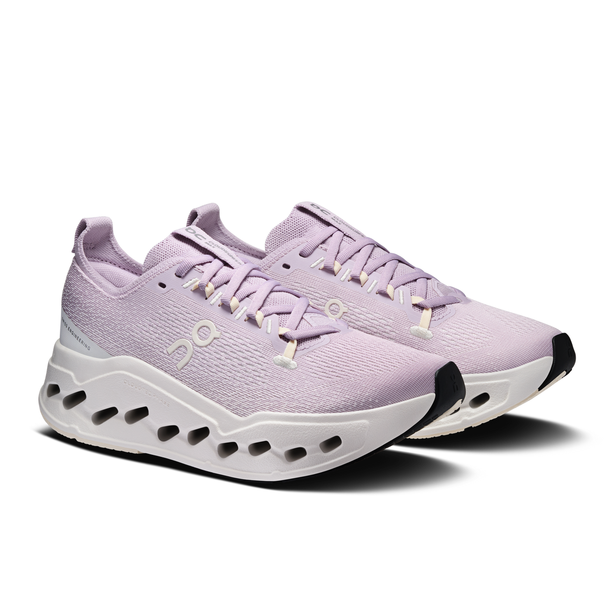 Lavender lace-up running sneakers with white CloudTec sole and yellow eyelets