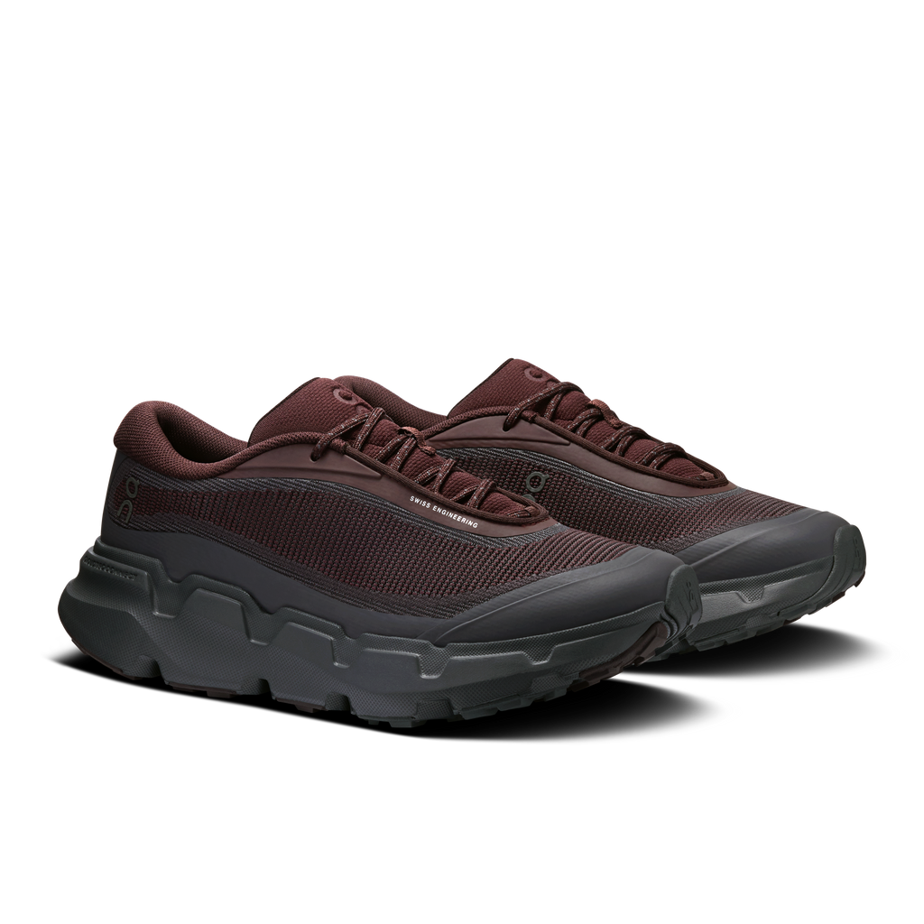 Maroon lace-up hiking shoes with textured upper and thick gray trail outsole