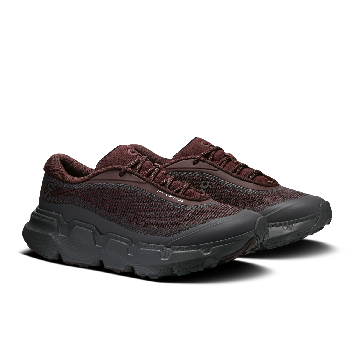 Maroon lace-up hiking shoes with textured upper and thick gray trail outsole
