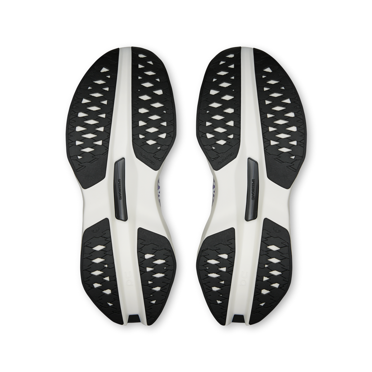 Men's running shoe outsoles, textured tread with white and black rubber pods