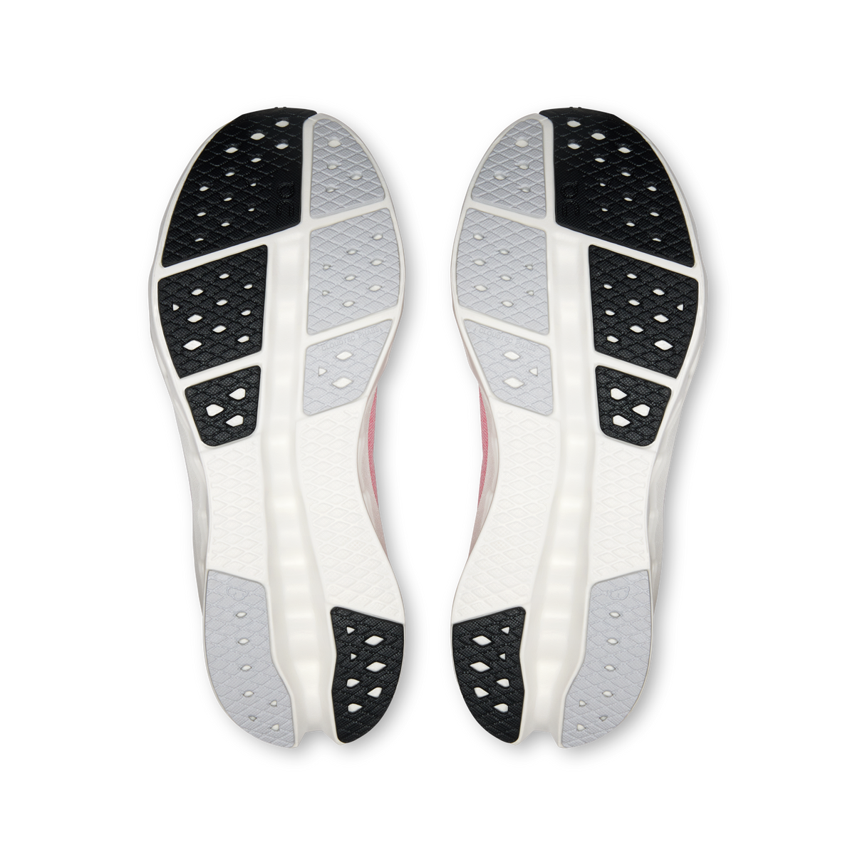 Pair of women's On Cloudsurfer 2 shoes outsole view, black traction pods on light sole