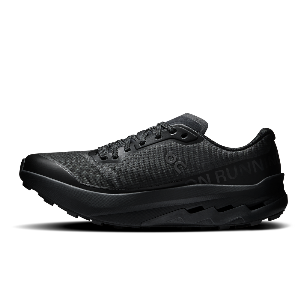 Women's black running shoe profile, lace-up upper and chunky rocker sole