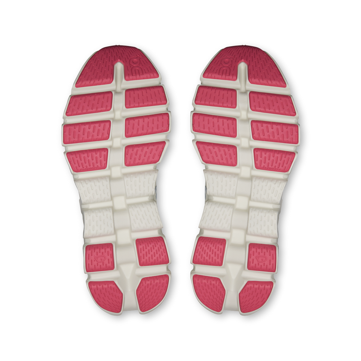 Shoe outsoles pair with red traction pads on white rubber base