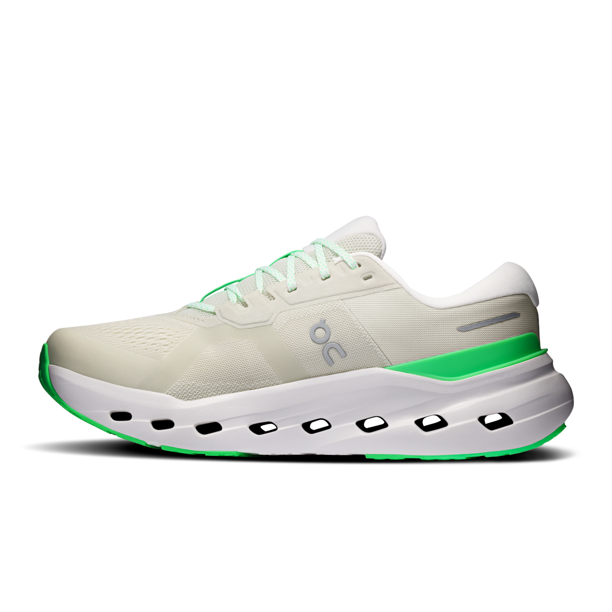 Light cream wide running shoe with green heel stripe, lace-up, cushioned white sole