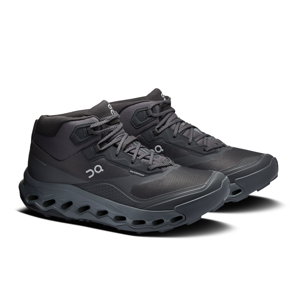 Men's waterproof mid hiking shoes by On, dark gray with double straps and chunky outsole