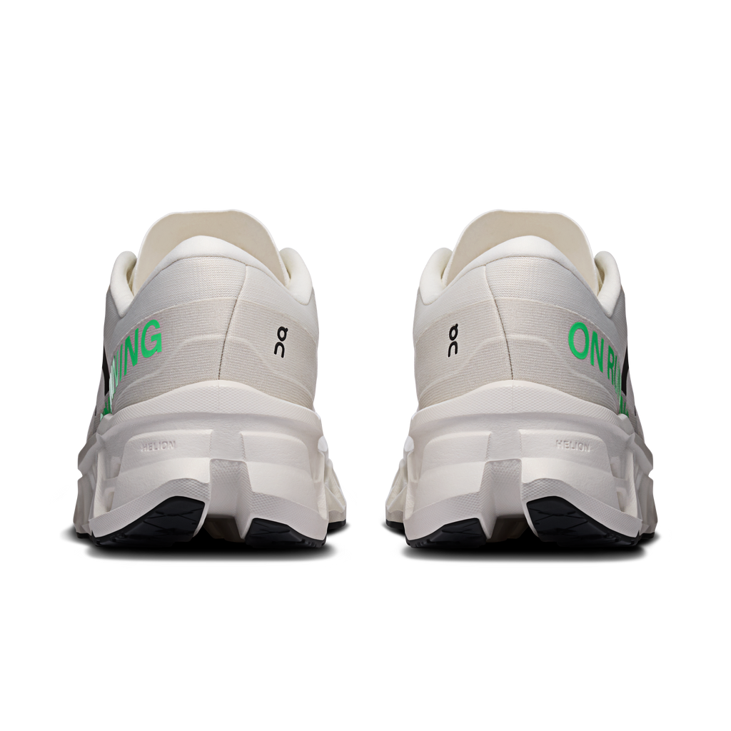 Men's ivory running sneakers with heel pull tabs and green side branding