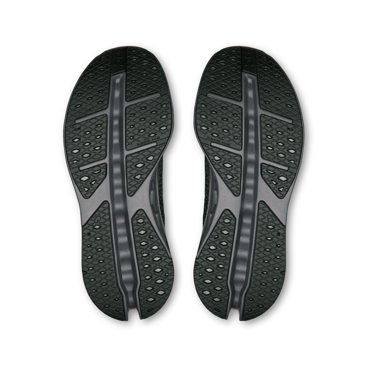 Women's running shoes outsole view with textured tread and central support