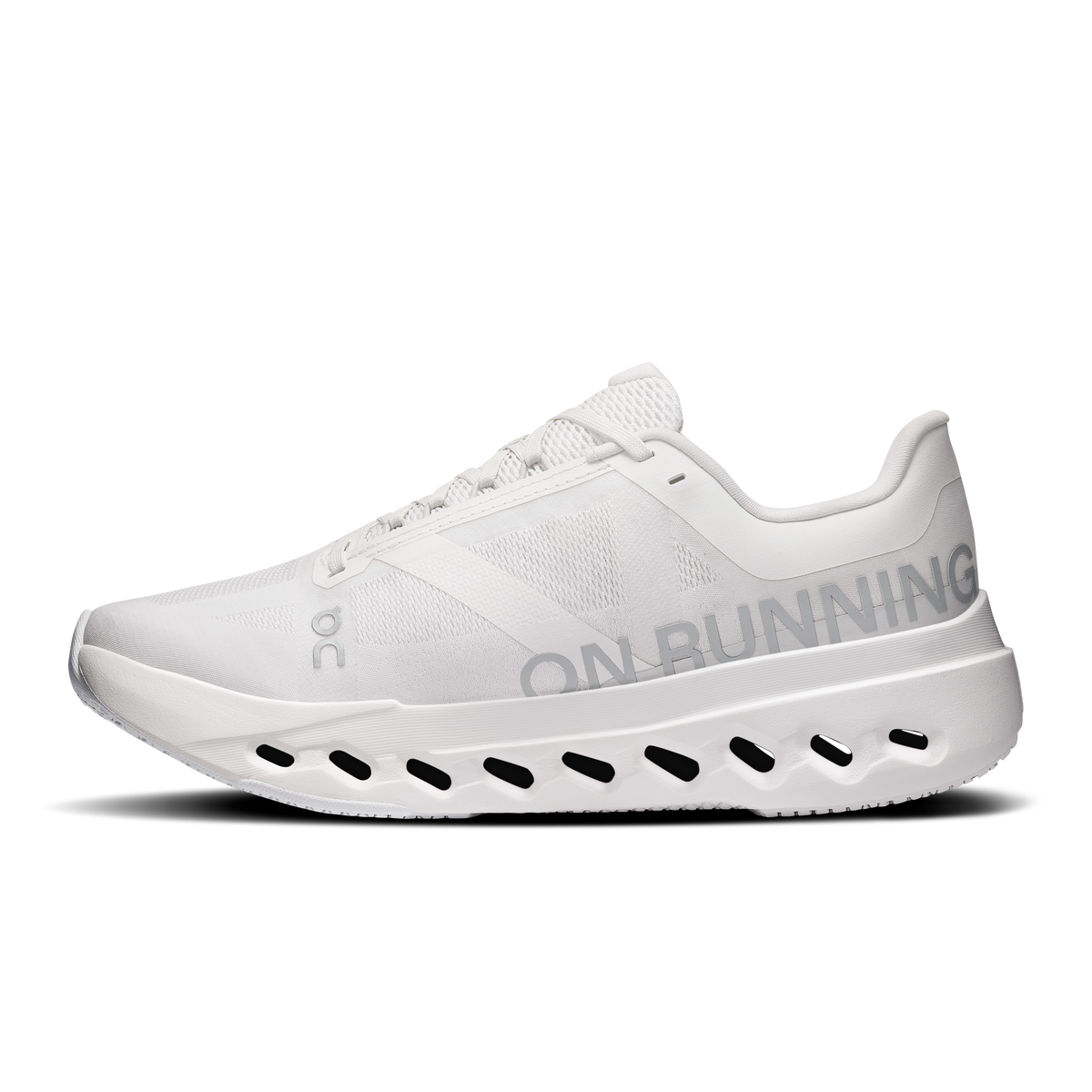 White women’s On running shoes, front quarter view with perforated midsole pods