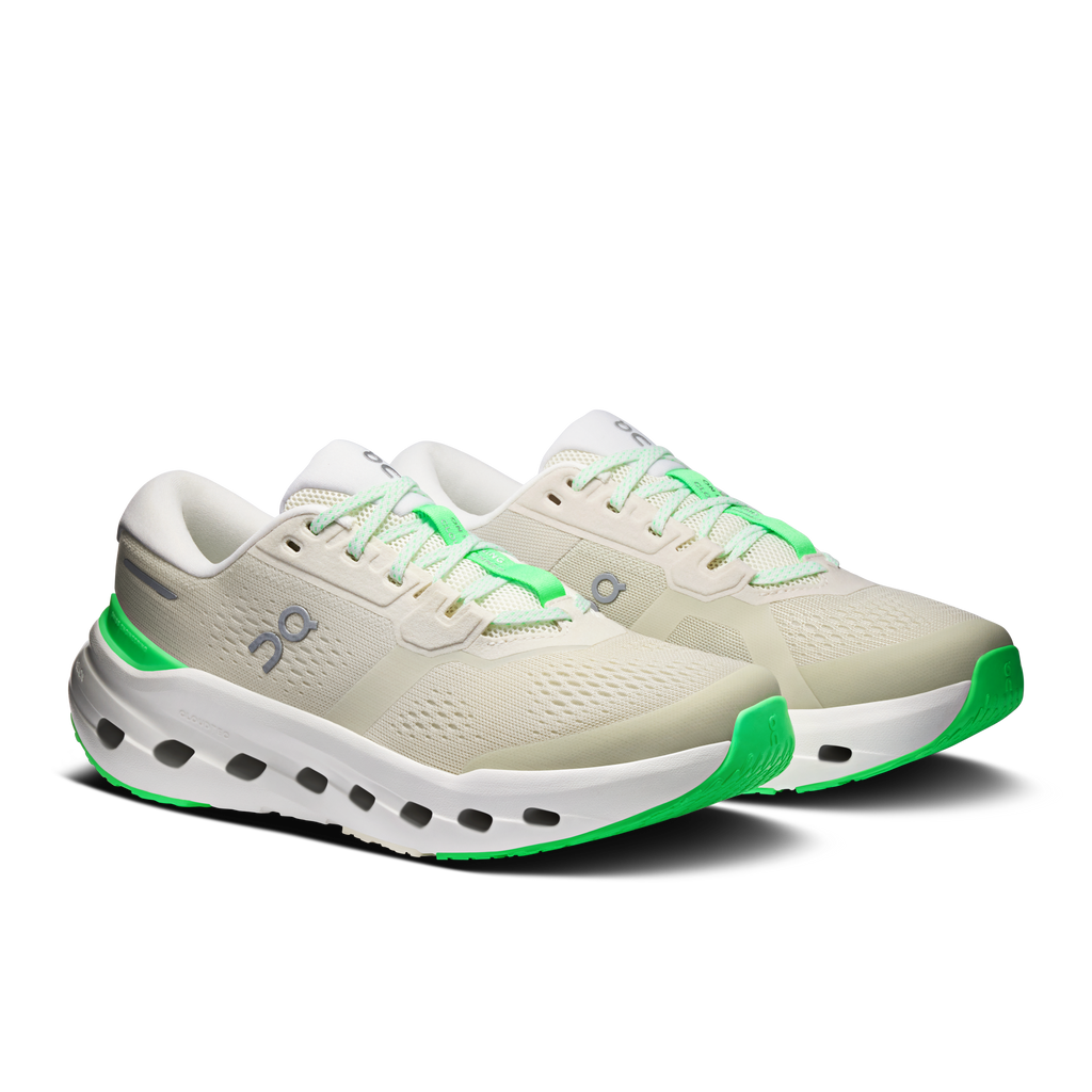 Women’s wide running shoes, off-white upper with neon green accents and cushioned pod sole