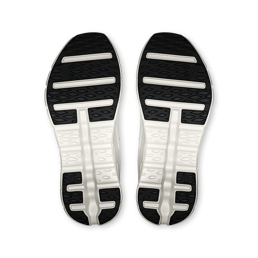 On Cloudtilt men's shoe outsoles with textured tread and dark rubber inserts