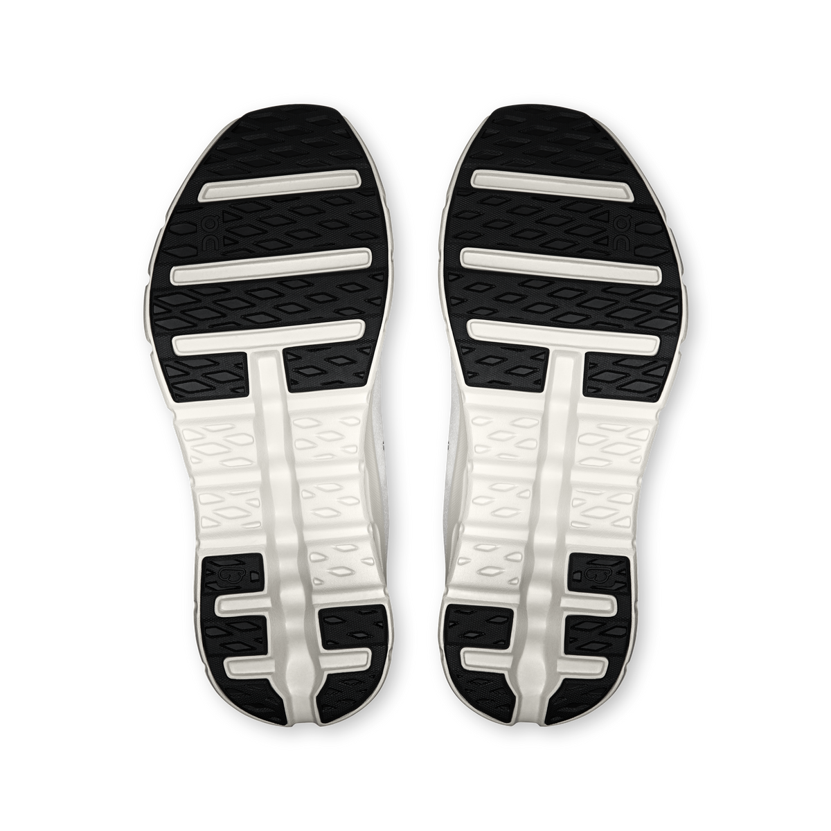 On Cloudtilt men's shoe outsoles with textured tread and dark rubber inserts