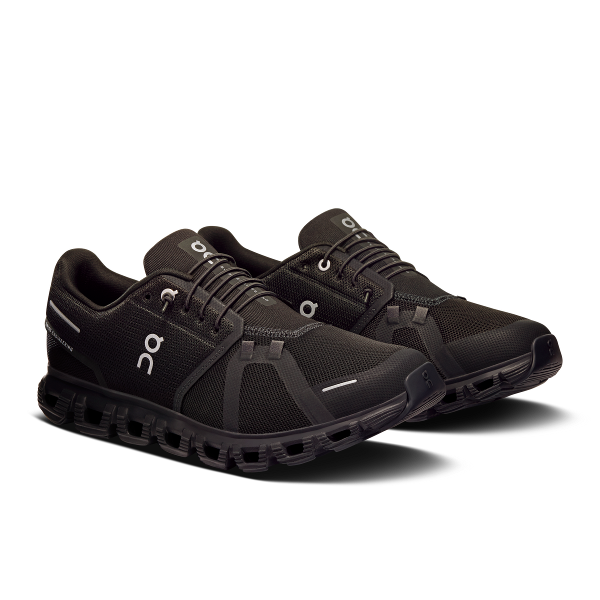 Men's black lace-up running shoes with On logo and textured mesh upper