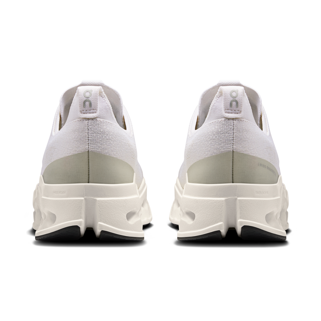 Men's white running shoes from the back with cushioned heel and lace tabs