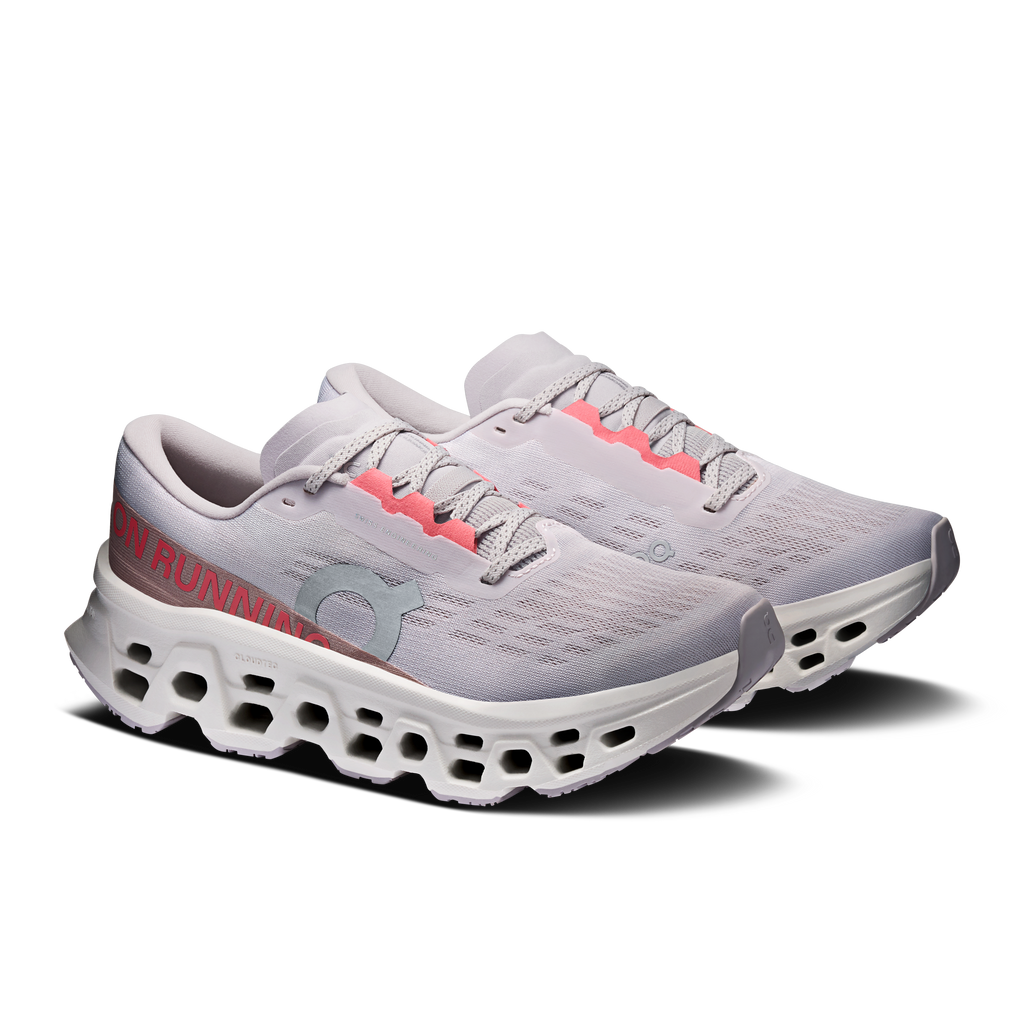 On Cloudmonster 3 women's running shoes, side view, light gray with red accents and pods sole