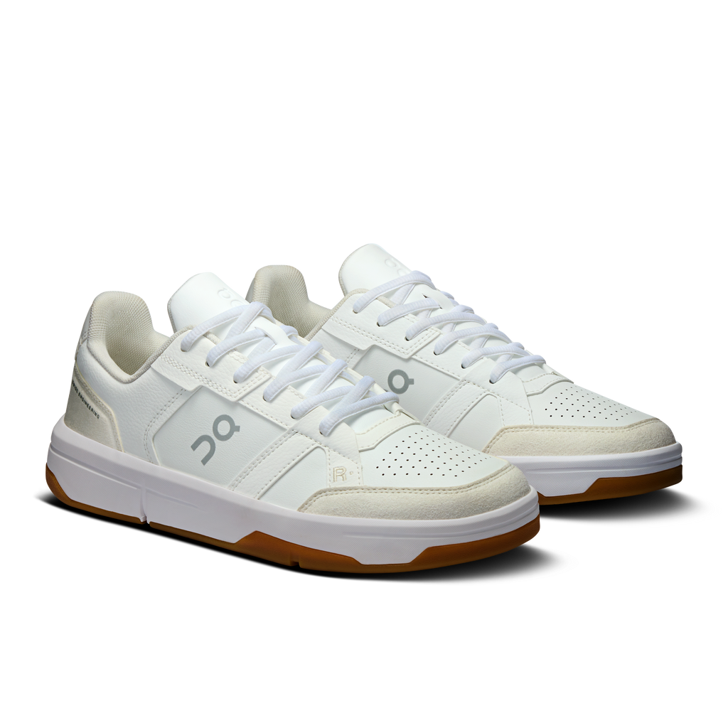 On women's white and ivory lace-up sneakers, side-by-side view