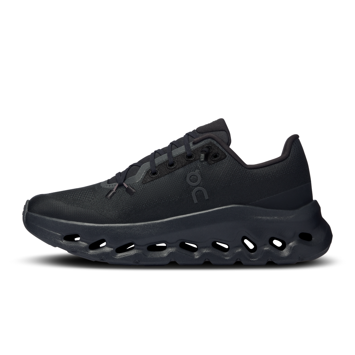 Women's black running shoes, side profile with lace-up upper and thick sole
