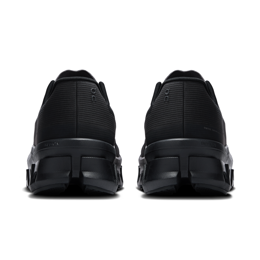 Back view of men's black running shoes with cushioned heel and lace-up closure
