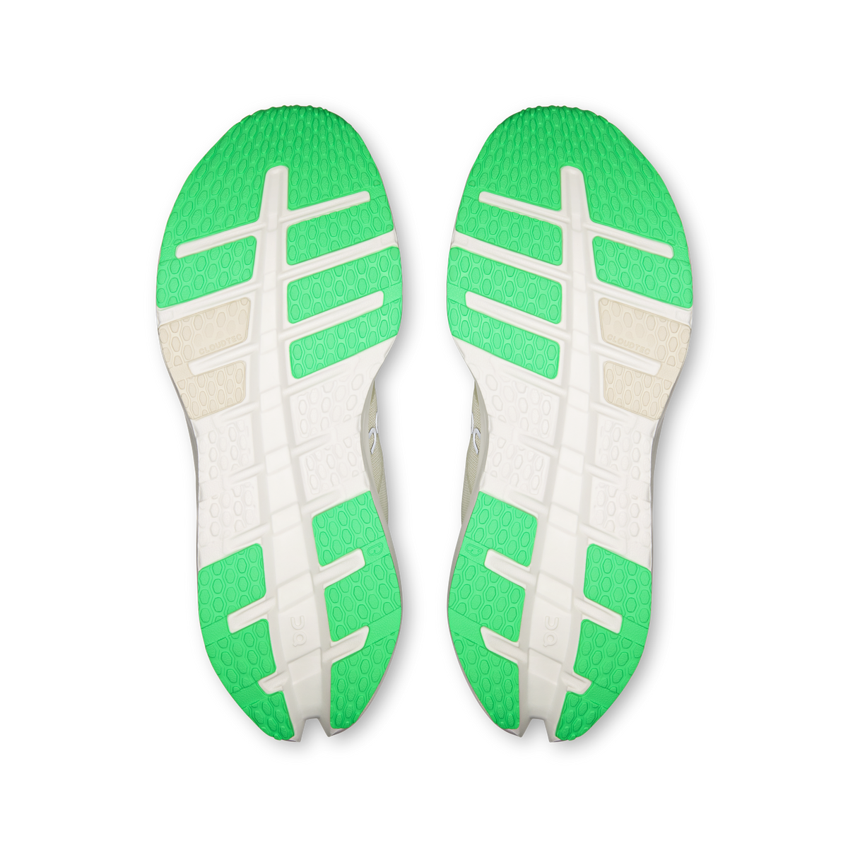 Pair of shoe outsoles with green tread and light panels for grip.
