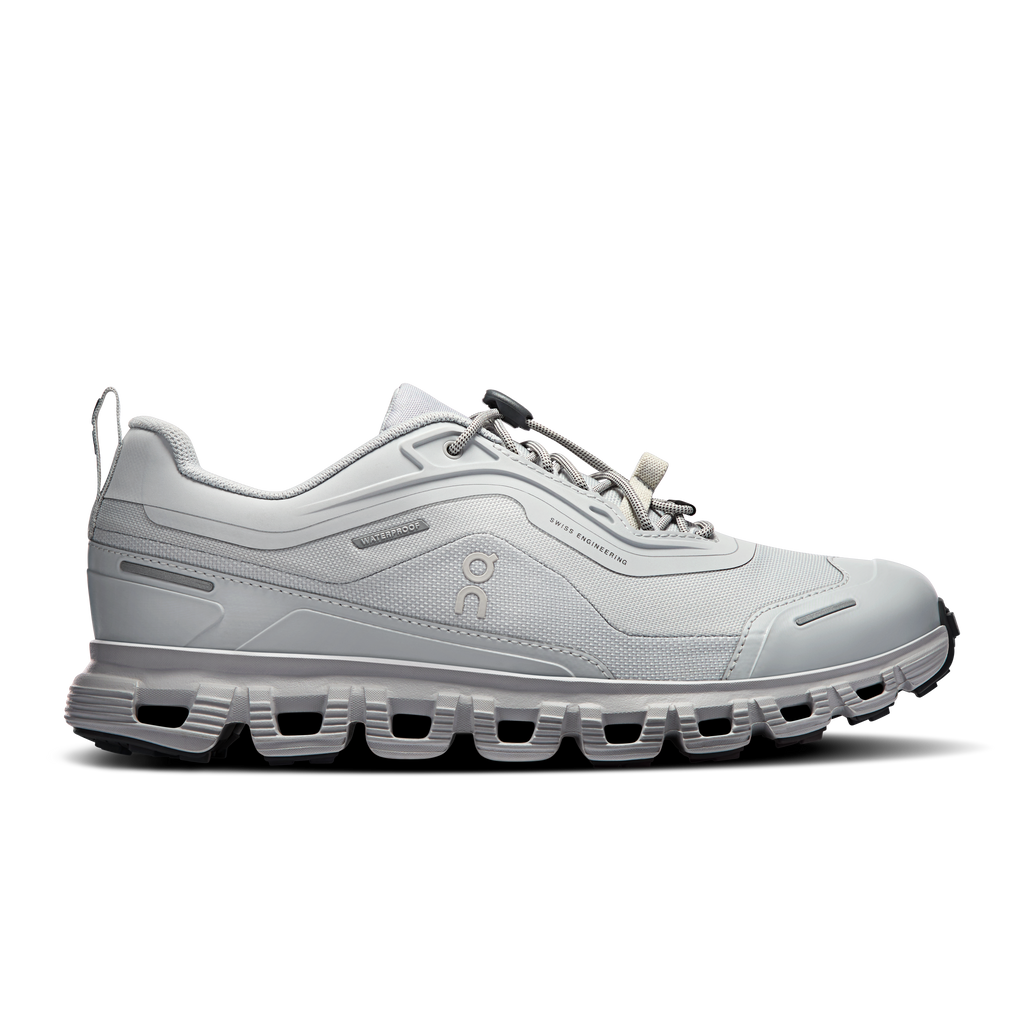 Women's waterproof running shoes by On, light gray with lace-up and CloudTec sole