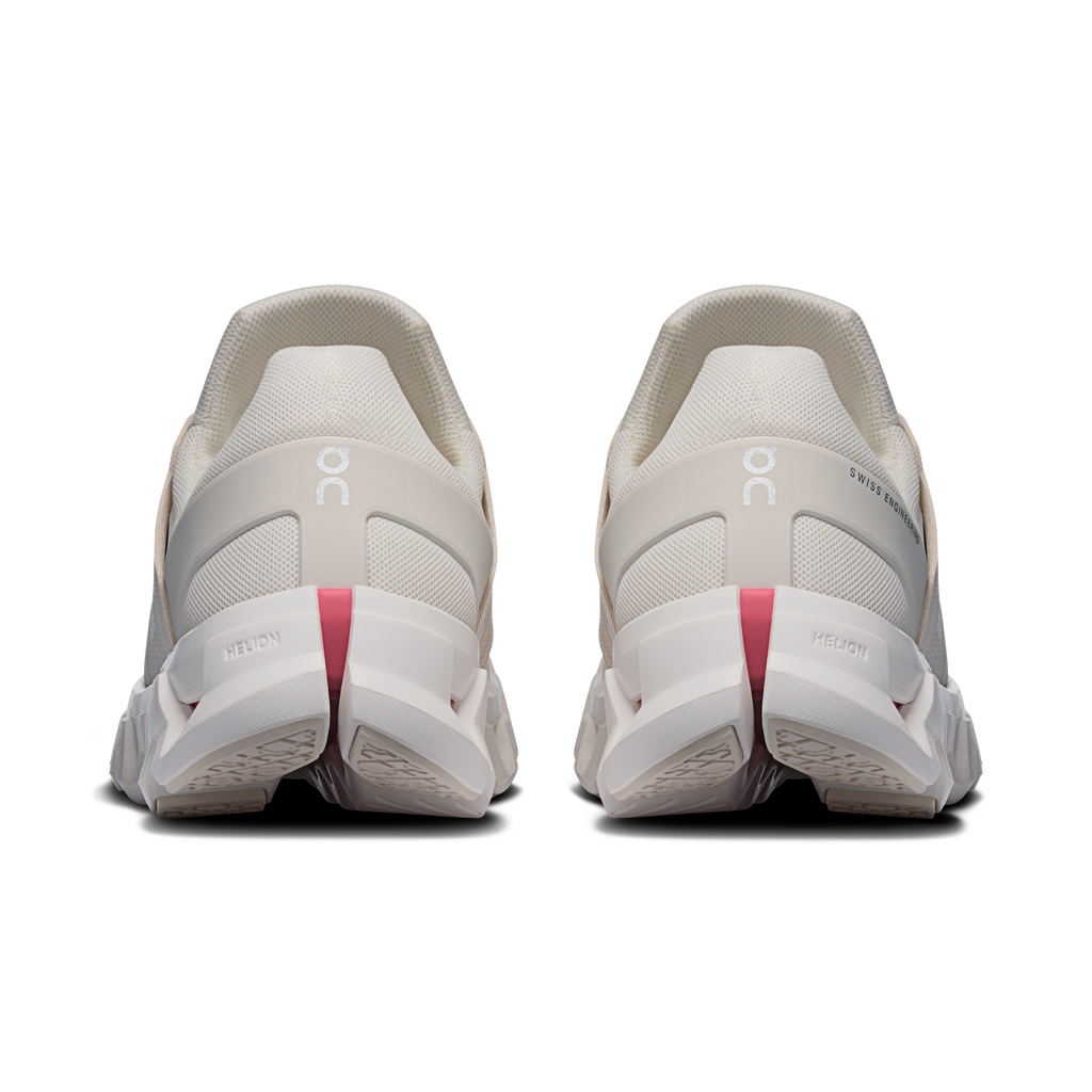 On Cloudswift 4 heel view shoes with white backs, gray lining, and red/pink accents