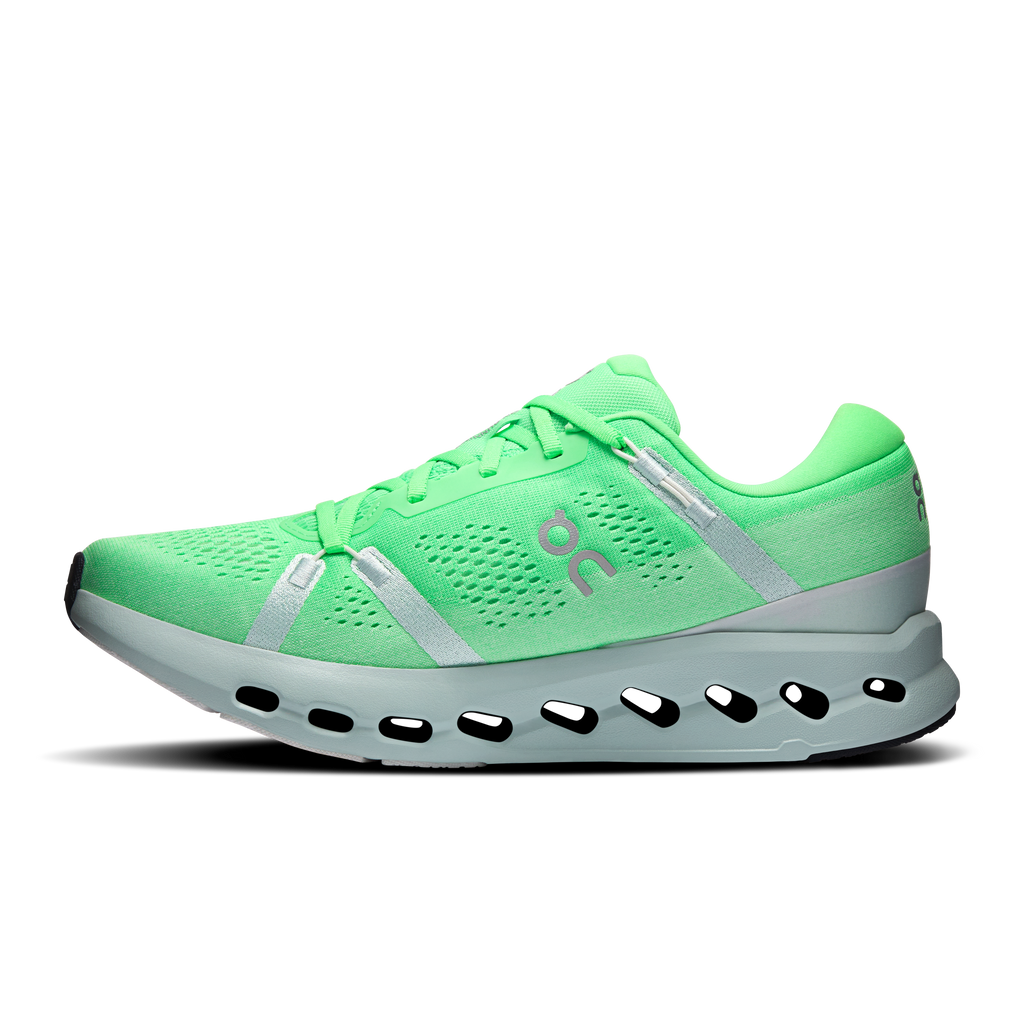 Men's green running shoe with lace-up front, silver accent stripe, CloudTec sole