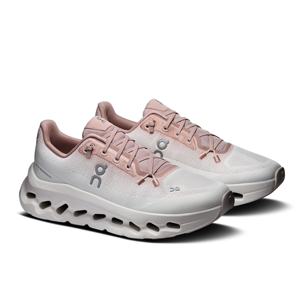 Women’s running shoes, light biscuit upper with lace-up front and cushioned sole