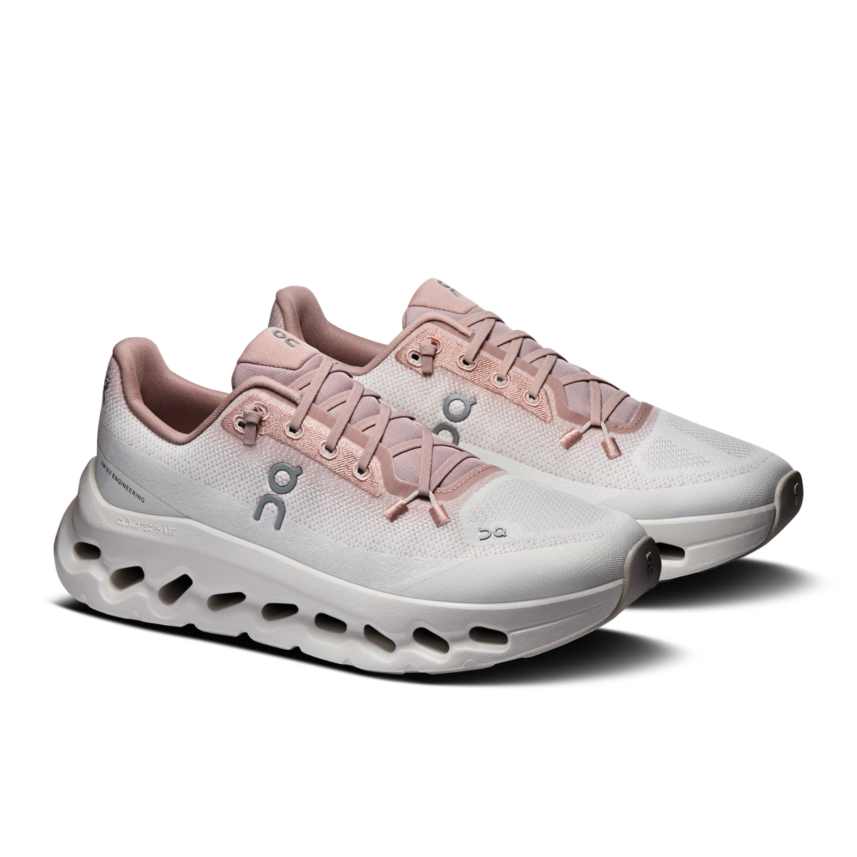 Women’s running shoes, light biscuit upper with lace-up front and cushioned sole