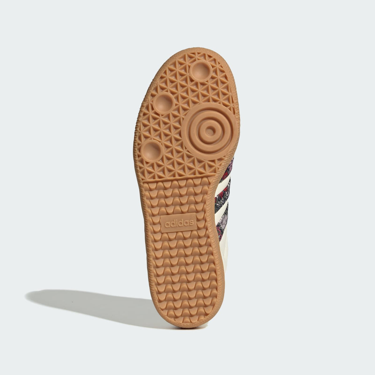Kids' gum rubber outsole with textured tread and adidas logo