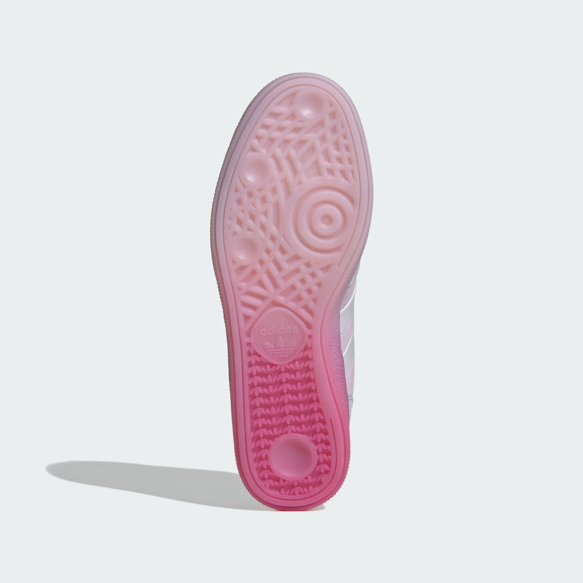 Adidas men’s low-top shoe outsole in pink with textured traction pattern