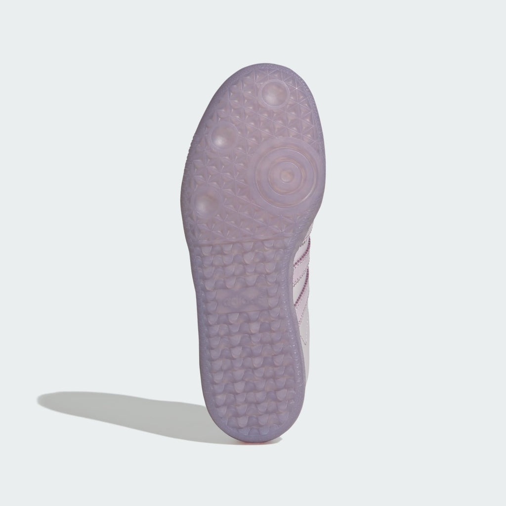Kids' Adidas sneakers outsole with textured tread pattern in ice lavender.