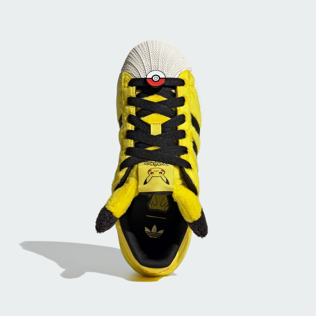 Adidas Kids' Pokémon Superstar II shoe, yellow with black laces and Pokémon details