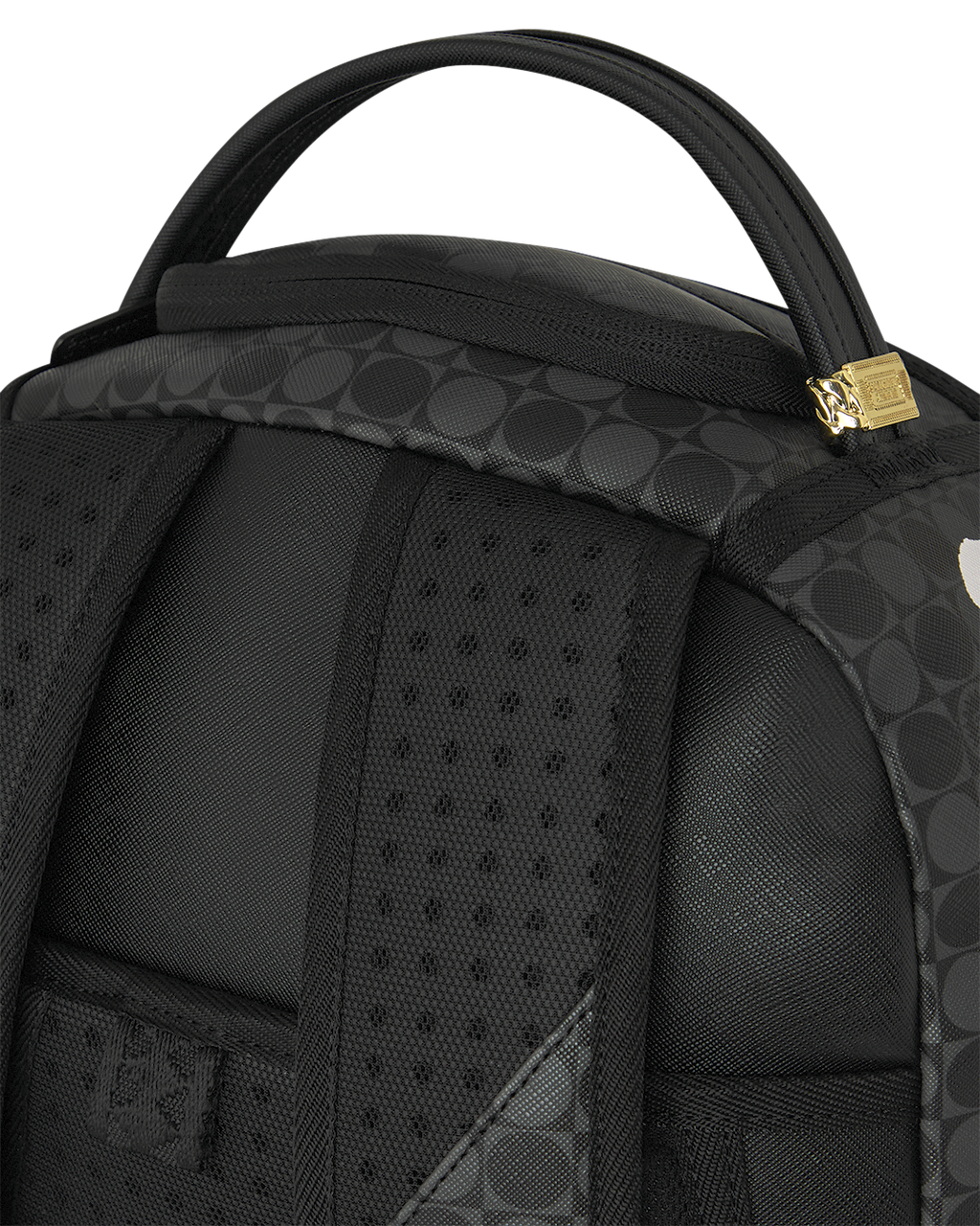 Black backpack top with padded handle, textured side panels, and small gold logo patch