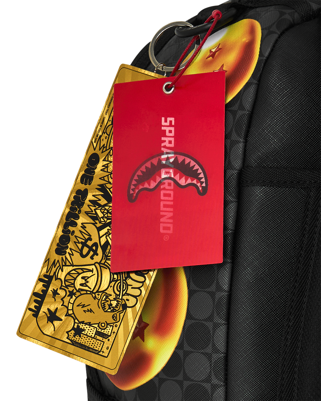 Black backpack with hanging red and yellow hang tags and metal ring attachment
