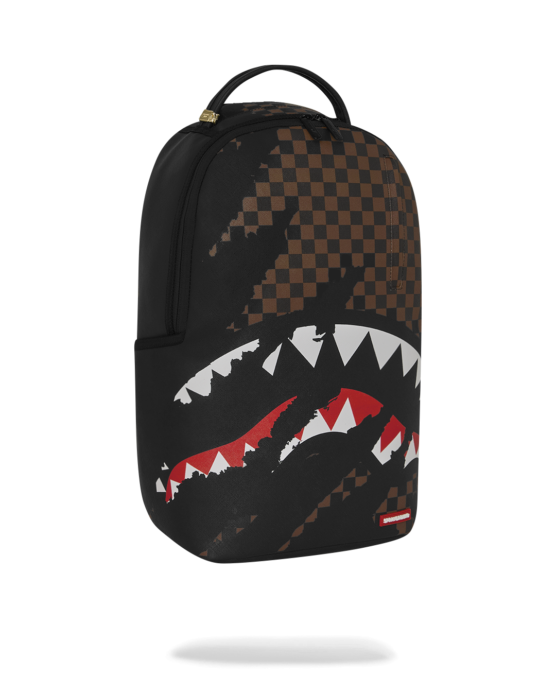 Black backpack with brown checkered top and large red/white shark graphic