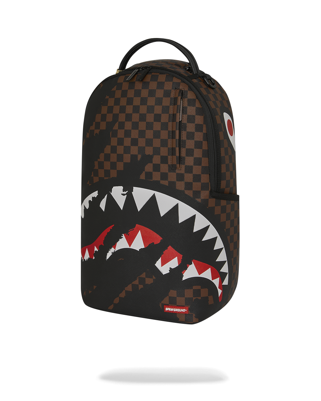 Black backpack with brown checkered front panel and red/white shark mouth design
