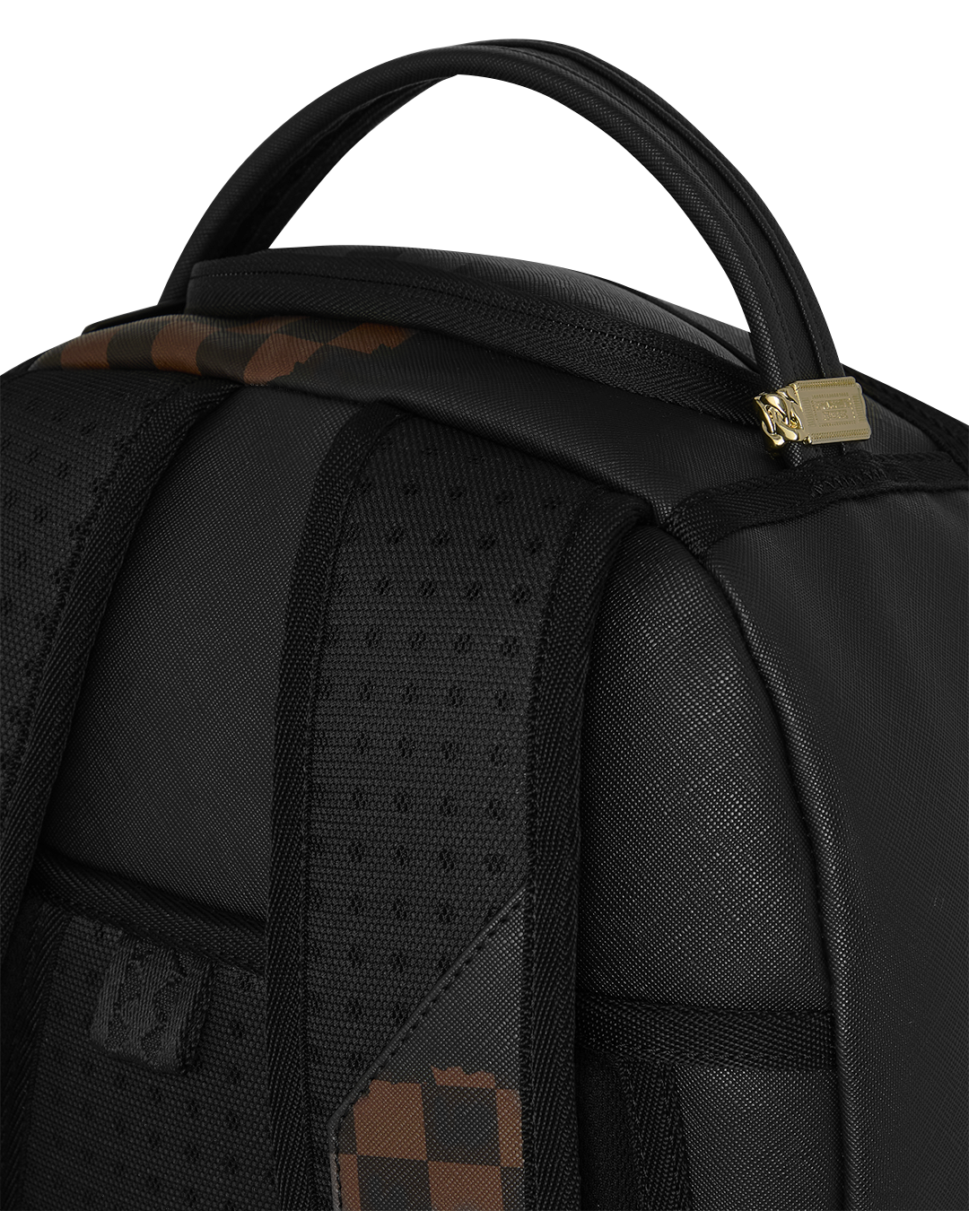 Close-up of black padded backpack straps with textured panel detail