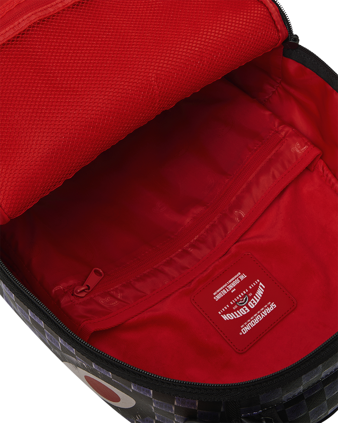 Backpack with red interior lining and zip pocket