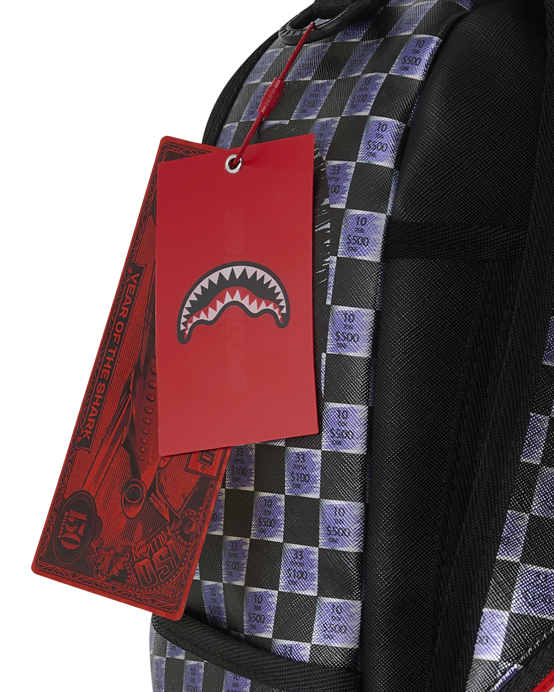 Backpack with checker-print panel and hanging retail tags
