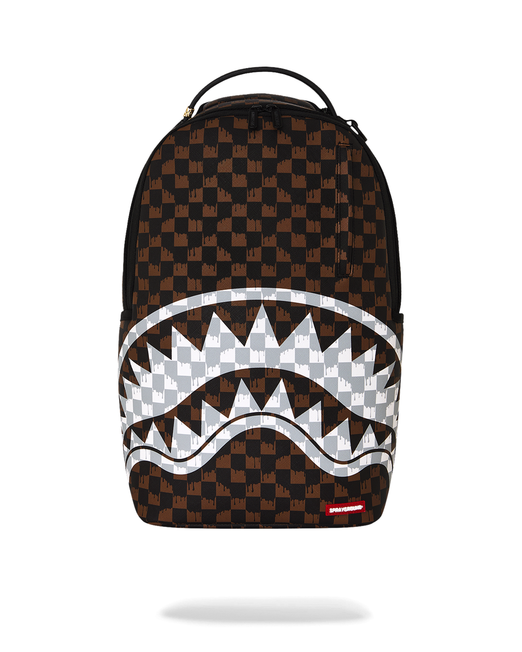 Brown checkered backpack with white jagged fang-style graphic and top handle