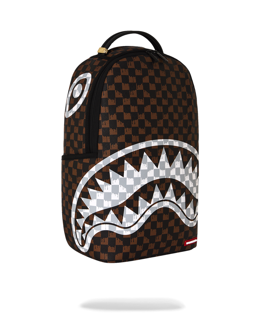 Brown checkered mini backpack with white fang-style graphic and side tag