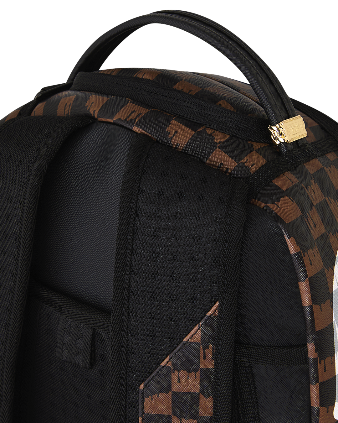 Brown checkered backpack close-up with black front pocket and gold-tone buckle