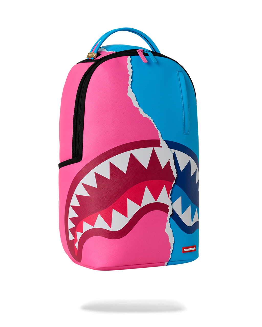 Teal-and-pink shark graphic mini backpack with vertical front zipper pocket
