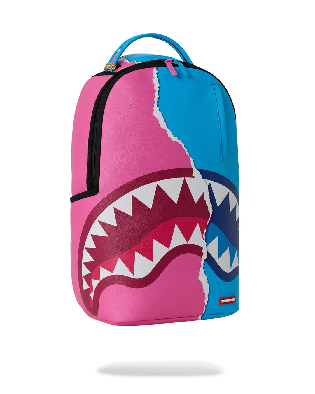 Teal-and-pink shark graphic mini backpack with vertical front zipper pocket
