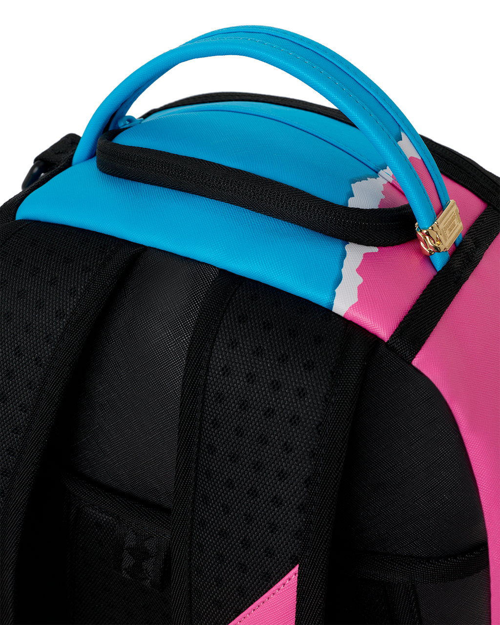 Close-up of padded top and black front panel on shark-themed mini backpack