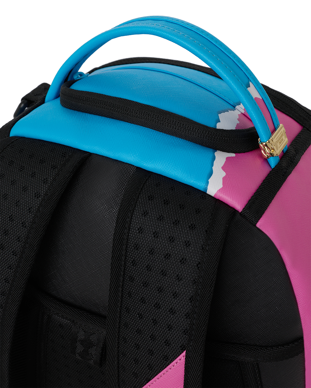 Close-up of padded top and black front panel on shark-themed mini backpack