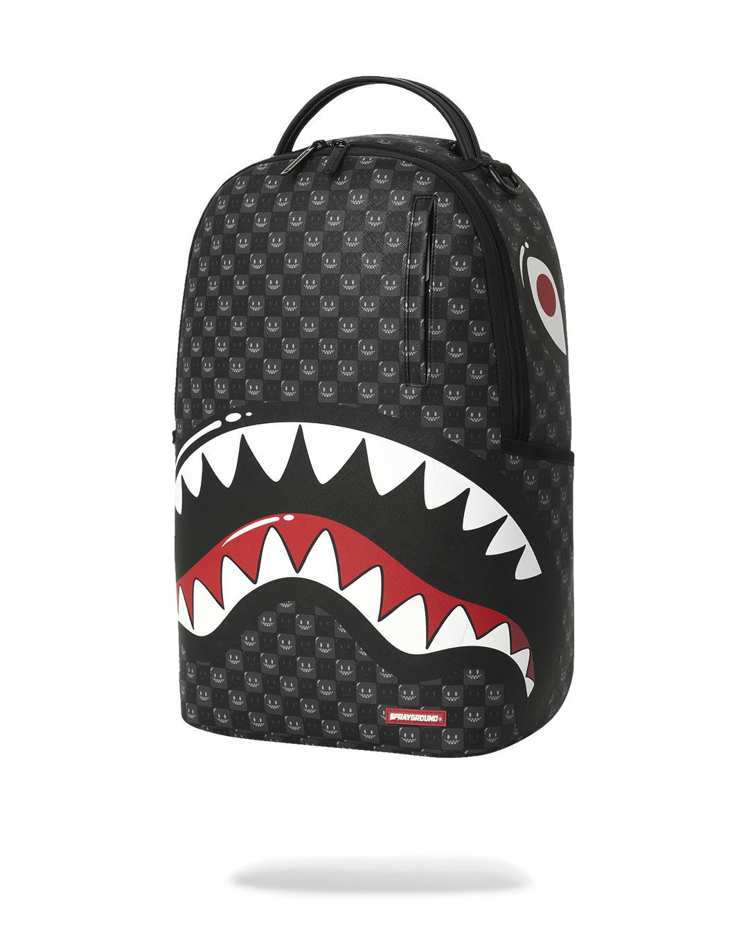Sprayground shark-mouth backpack bag, black with red and white jaws graphic, front view
