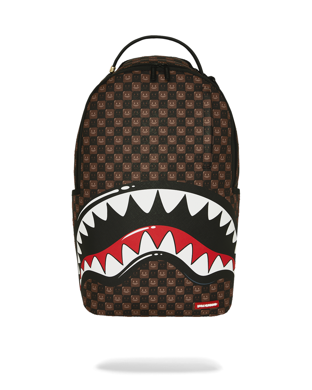 Brown patterned backpack with large shark-mouth graphic and red-and-white teeth